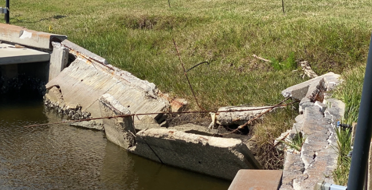 Failing seawall damaged by hurricane Ian