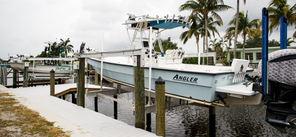 Custom dock and 5k and 10k boat lift installed by submerged consultants